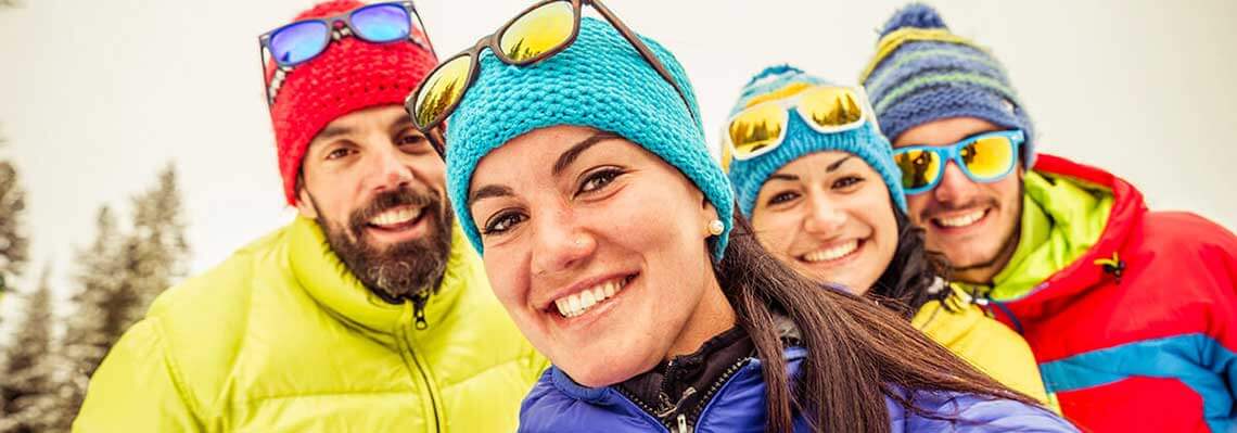 Group of snow skiers smiling